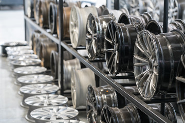 Various alloy wheels in store, selective focus.
Car alloy wheels at a wheel shop.