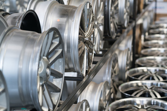 Various alloy wheels in store, selective focus.
Car alloy wheels at a wheel shop.