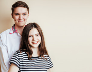 young pretty teenage couple, hipster guy with his girlfriend hap