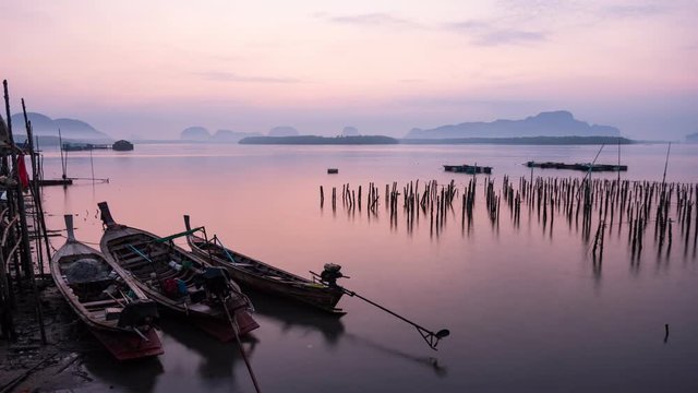 4K-Time Lapse of tropical sea and beautiful colorful sunrise or sunset at Bansamchongtai in Phang-nga province Thailand.