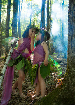 Sisters dressed as Fairies in the Forest