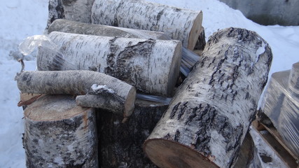 Birch wood prepared for transportation.