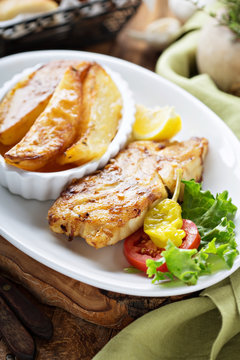 Grilled fish with roasted potatoes