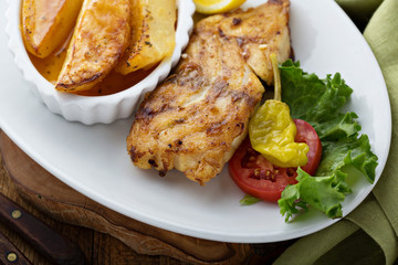 Grilled fish with roasted potatoes