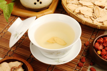 A cup of  ginseng tea on the table 