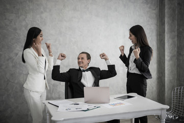 Happy business team enjoy success deal business.Teamwork leadership concept..