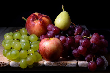still life of fruits with apples, grapes, pears and peaches © charlymorlock