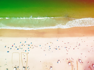 Aerial view of Copacabana beach during summer, sun with clouds.