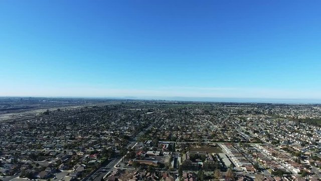Aerial Shot - Community park descending with neighborhood in background