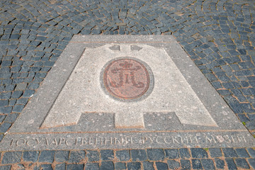 RUSSIA, SAINT PETERSBURG - AUGUST 18, 2017: Memorable memorial sign with the coat of arms of Pavel I near the Mikhailovsky Castle (Engineers Castle)