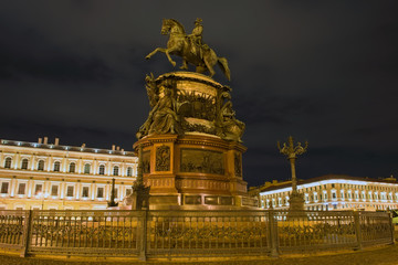 RUSSIA, SAINT PETERSBURG - AUGUST 18, 2017:  Monument to Nicholas 1 on St. Isaac's Square, night illumination, long exposure light