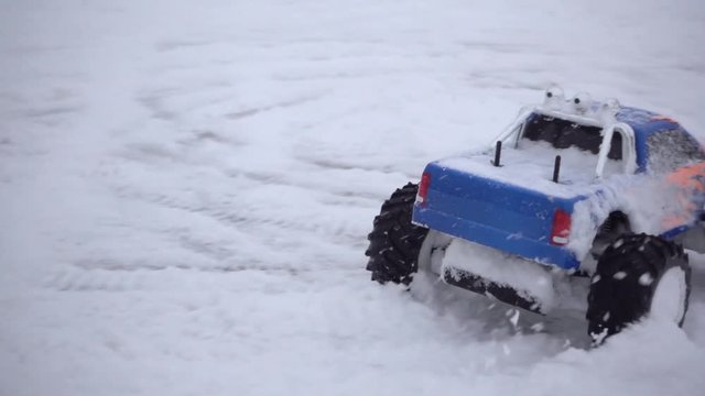 RC off-road truck car in snow slow motion