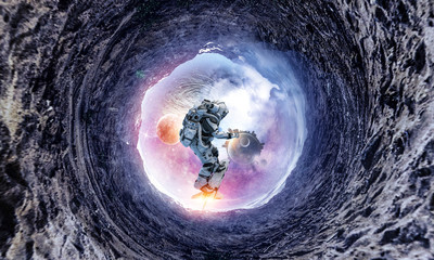 Space hole and astronaut. Mixed media