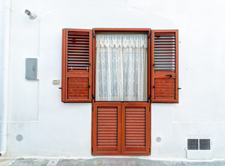 Colorful facade of Italian style old house