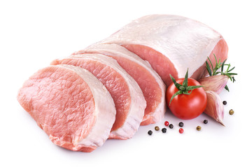 Raw sliced pork loin with tomato, pepper, rosemary and garlic isolated on white background. Fresh meat. - obrazy, fototapety, plakaty