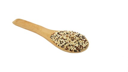 Three colour quinoa on wooden spoon isolated on white background.organic superfood.raw seeds