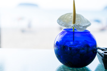 Table set for dining at restaurant at beach