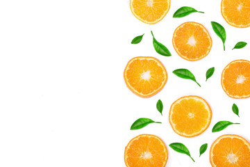 Slices of orange or tangerine with leaves isolated on white background with copy space for your text. Flat lay, top view