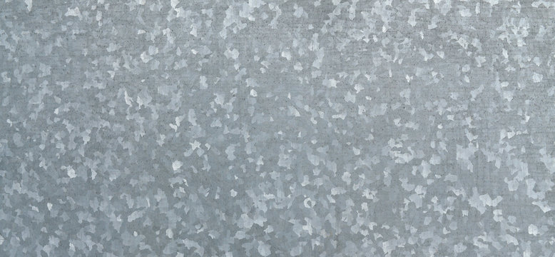 Zinc galvanized grunge metal texture may be used as background. Texture of galvanized iron roof plate background pattern