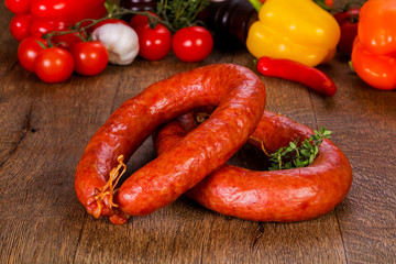 Pork sausages over wooden