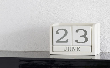 White block calendar present date 23 and month June
