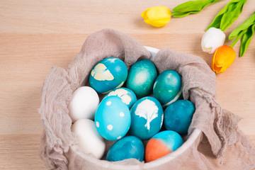 Happy easter, organic blue easter eggs with white color eggs wait for painting, easter holiday decorations, easter concept backgrounds with copy space