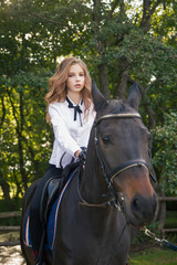 Obraz premium girl teenager with a horse