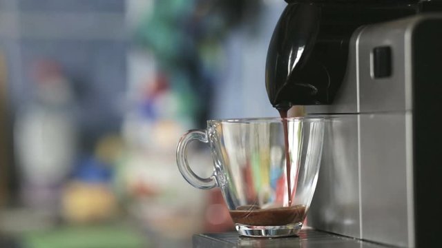 Cinemagraph: preparation of natural delicious coffee in the automatic coffee machine good morning