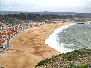 Nazare coast and sandy beach view Portugal with ocean view