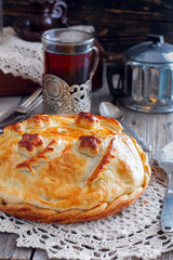 Traditional festive Russian pie - Kournik in Russian style, selective focus, the concept of national food © Анна Журавлева