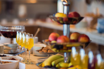 Fresh and bright continental breakfast table with jam. Table settings
