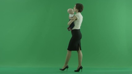 A Business woman going from the right side with her baby on the green screen