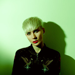 Girl Tomboy Rock Fashion. Short haircut Trend