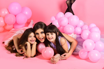 Mother and kid with pink balloons vintage