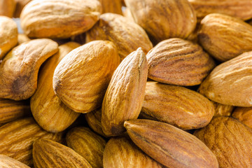 Close up of a pile of salted almonds