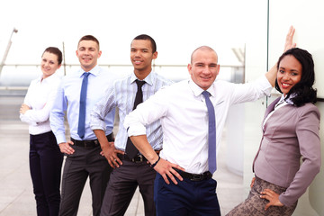 Group of business people with businessman leader on foreground