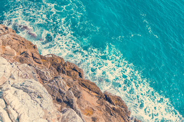 Top view of the rocks and the sea. Toned