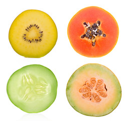 slice cucumber,Kiwi ,papaya and melon on white