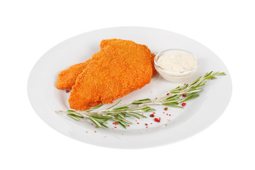 Schnitzel is cut into pieces of chicken, pork, meat, grilled, barbecued, with red pepper and rosemary isolated white background. Tartar, sour cream, mayonnaise sauce. For the menu Side view