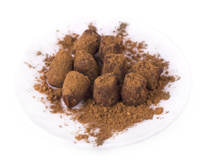 Homemade fresh energy truffle chocolate candies with cocoa powder made by chocolatier