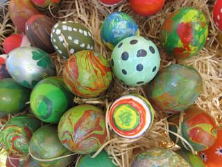Fototapeta na wymiar Easter Background. Easter Eggs decorated by children in the kindergarten