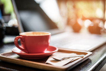 coffee latte on table in cafe shop. coffee break and relaxing concept.