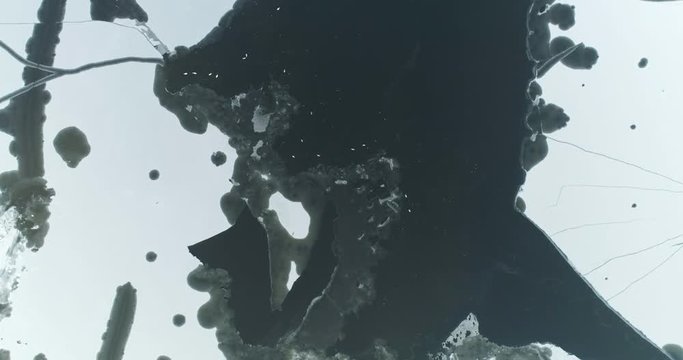 Aerial shots of frozen river in winter, 4k