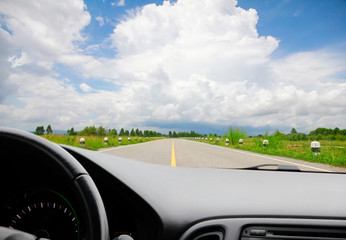 The view of the rural countryside area  from inside the car