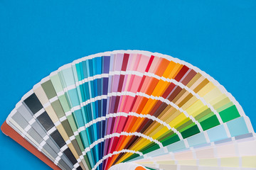 Colour palette sampler, isolated on blue background