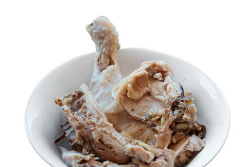 Boiled chicken. Cooked chicken carcass. Boiled chicken meat in plate.