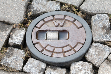 Runde Stra&szlig;enkappe f&uuml;r Absperrschieber einer Wasserleitung