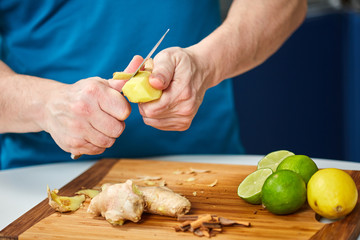 Man peeling ginger