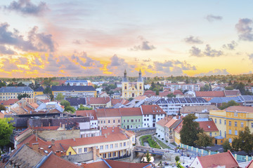 Beautiful view of the Minorit church and the panorama of the city of Eger, Hungary, at sunset