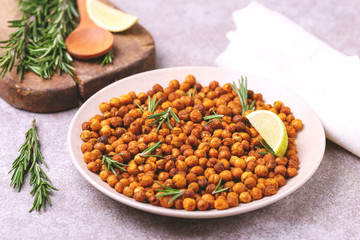 Indian cuisine. Roasted chickpeas with lime and rosemary